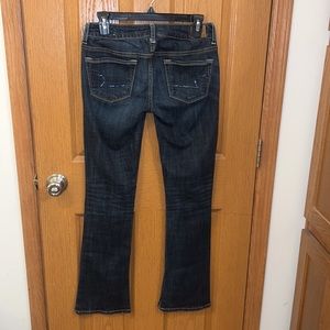 EUC American Eagle Skinny Kick Jeans with sequins on back pockets